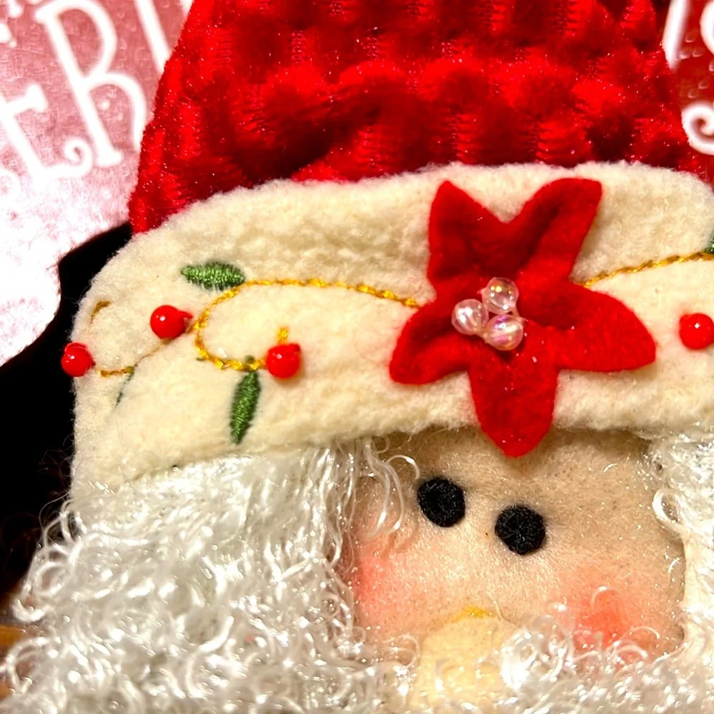 Festive. Merry Christmas. Sitting Santa Claus on the Wooden Bench.